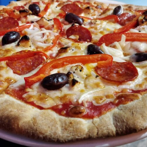 Tomato sauce, mozzarella, onions, olives, red peppers, pepperoni, Gozo cheese and oregano